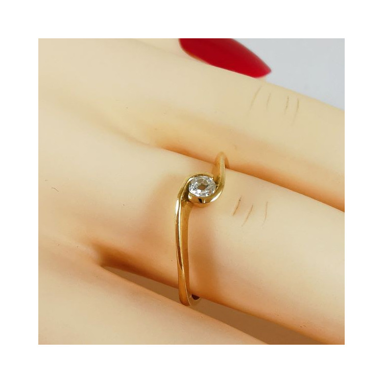 Bague "Tourbillon d'Amour" Solitaire Diamant 0.08 ct Or Jaune 750 - 18 carats  Bague de fiançailles